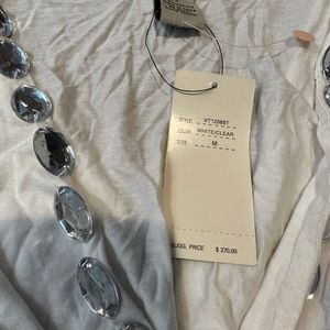 Casual or dressy jeweled tops.